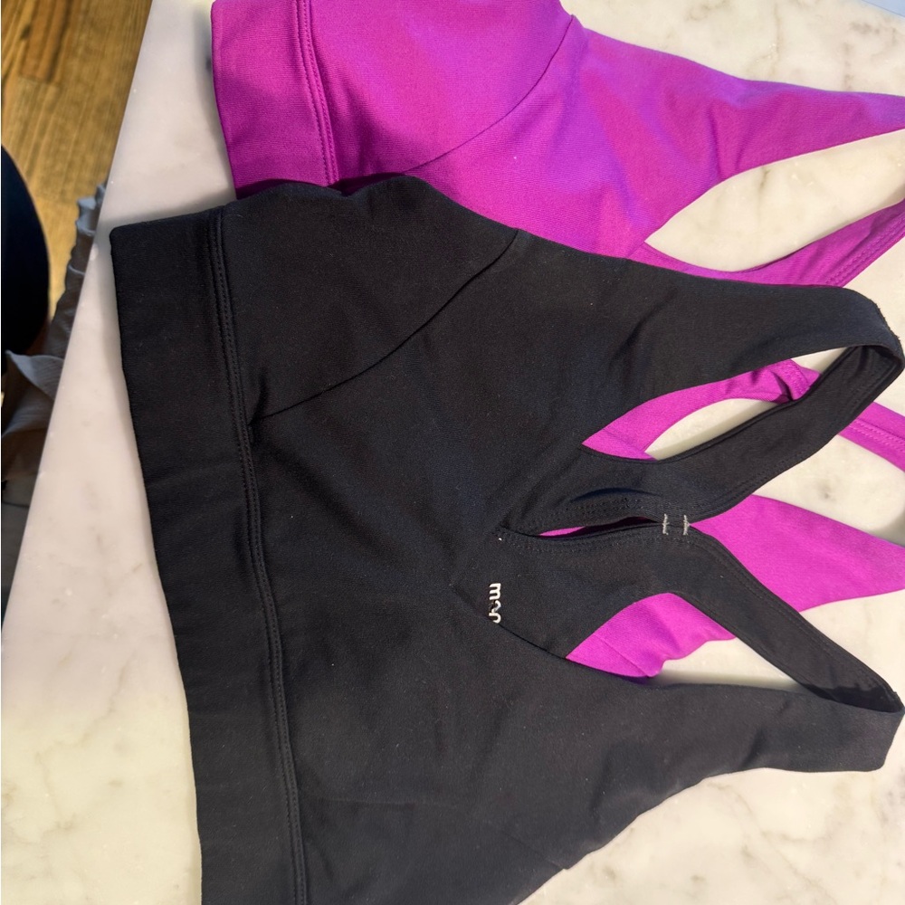 Manduka XS sports bras - one pink, one black